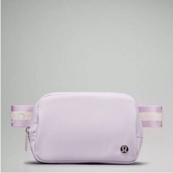 NWOT Lululemon Everywhere Belt Bag 1L
Wordmark- Lilac Ether/White Opal/White - Picture 1 of 16